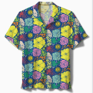 Picture of a blue centennial aloha shirt with floral print, lions logo, and a shell with the words "Hawaii Lions 100 years"